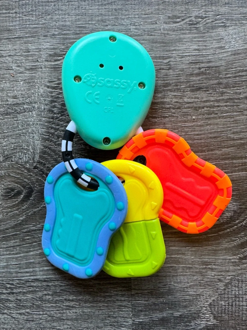 Sassy baby rattle with four colorful keys